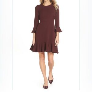 NWT Stylish With Sleeve and Hem Flounce in Beautiful Wine Color!